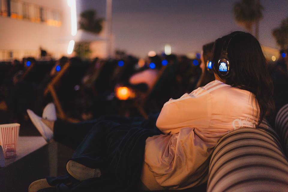 Wireless head phones make for a social experience.