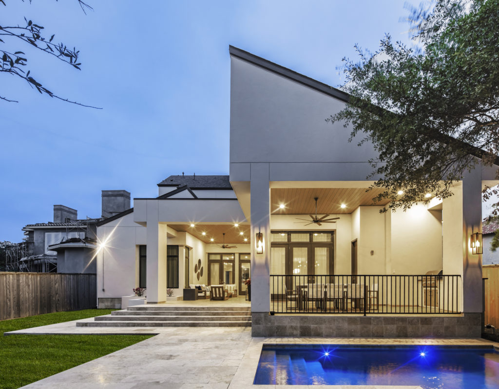 The beauty of outdoor living comes to life at 5136 Huckleberry Circle in Tanglewood where the home and pool were built by Frankel Building Group and the firm's Avea Pools.