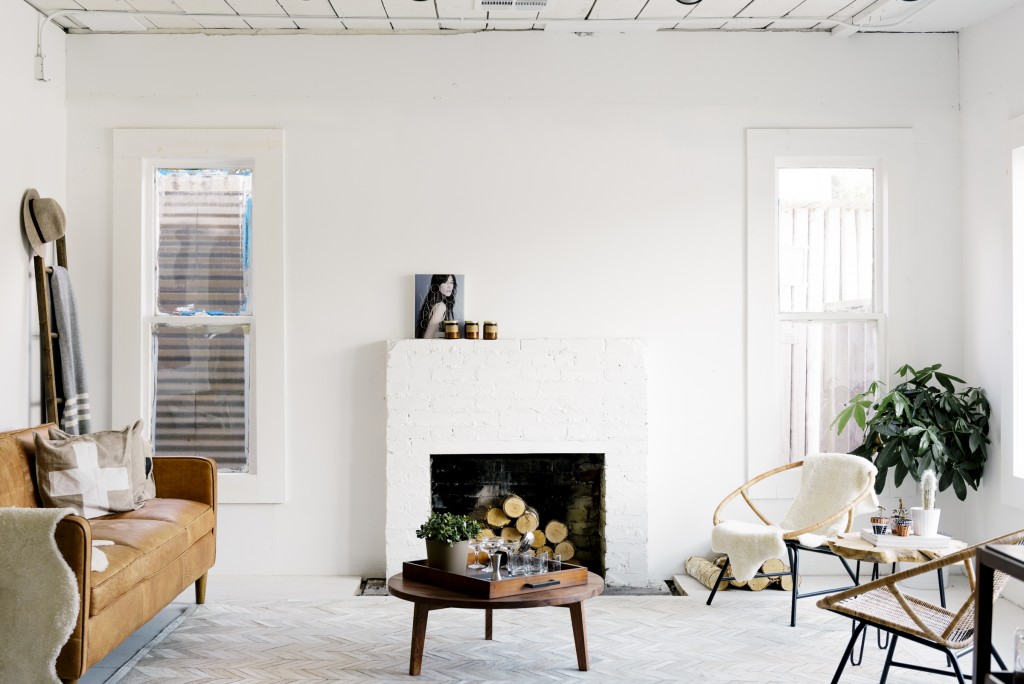 A fireplace is the center of the store's homey environment.