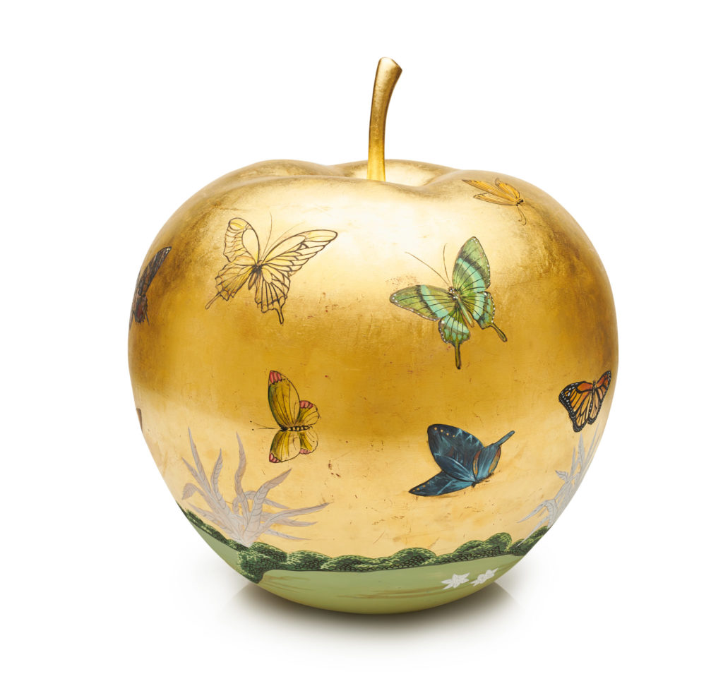 Gracie wallpaper applied 24K gold leaf before delicately hand-painting a scene of butterflies.