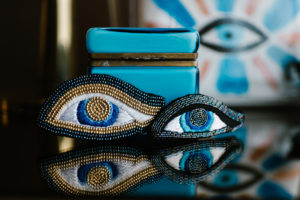KCA design kris Ammon’s all-seeing eye.
