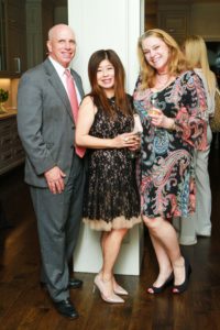 David Webster, Rose Chen, Lisa Lehman at the John Daugherty open house in Memorial.