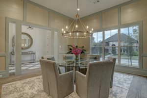 2502 Goldsmith – grasscloth covers the dining room walls
