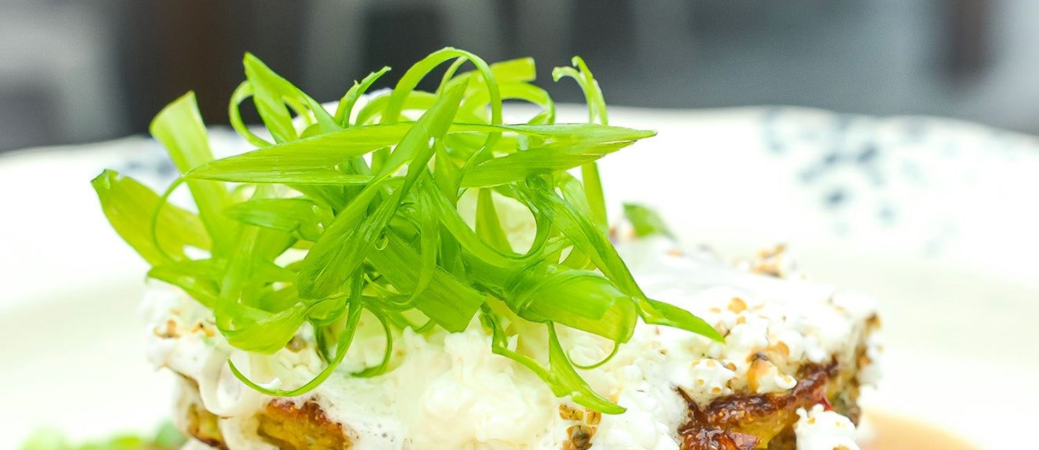 Whistle Britches – Sweet Corn Hoecakes Jalapeño Cane Syrup, Honey Butter, Popped Sorghum, Ginger, Scallion