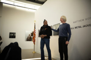 Houston’s military veteran liaison, Lashondra Jones, speaks with Matthew Modine at the veteran’s lunch hosted by Alta Arts on January 23.