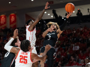 University of Houston Cougars basketball team clinched the American Athletic Conference crown with a win over Cincinnati, 71-53 at the Fertitta Center
