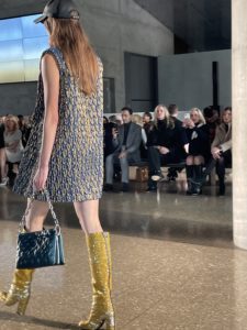Perot – Yellow sequined boots pop on the runway. Photo by Courtney Dabney.