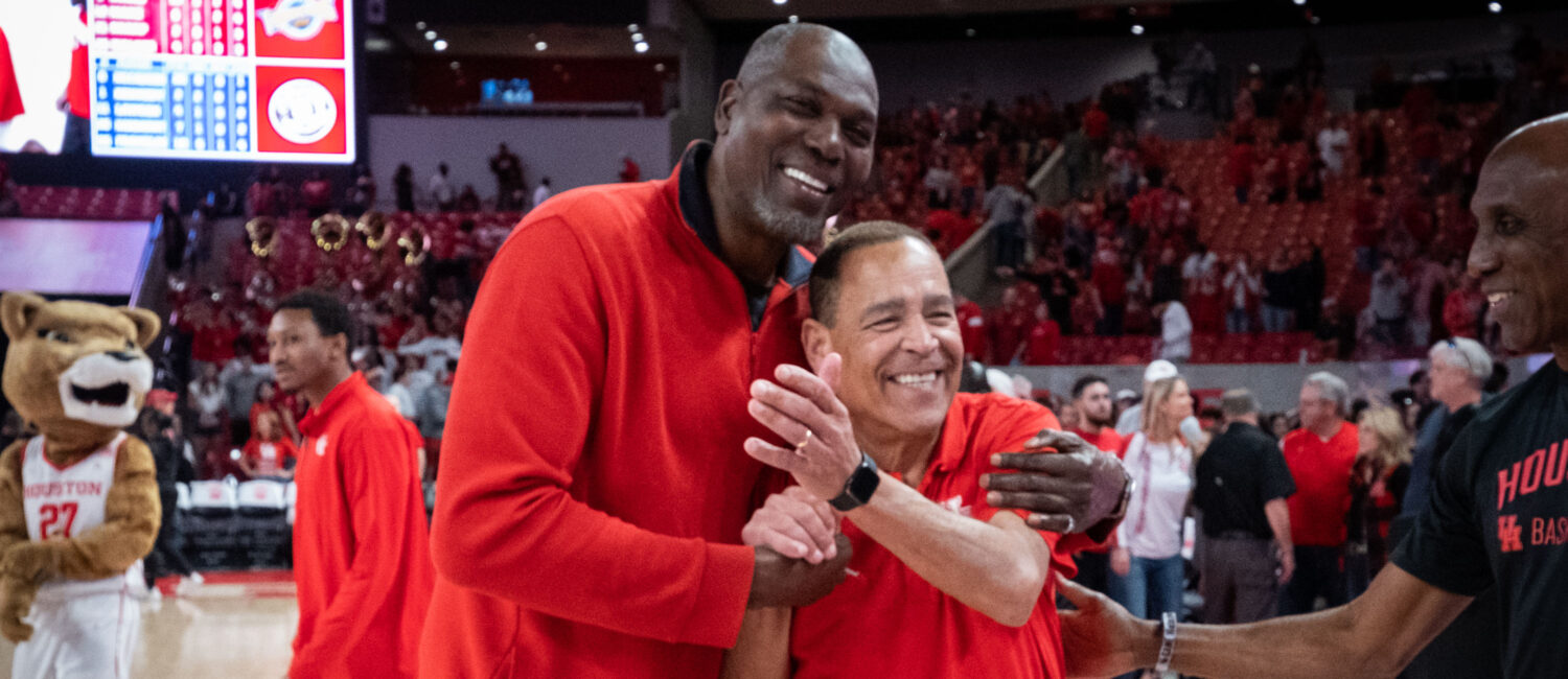 Basketball Hall of Famer Hakeem Olajuwon and University of Houston coach Kelvin Sampson make each other smile. (Photo by F. Carter Smith)
