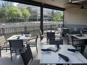 Fleming's revamped patio brings a great view of The Woodlands Waterway.