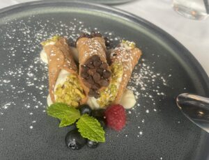 The cannoli are pistachio and chocolate chip at Azzurro Italian Coastal Cuisine. And  at about three inches, they’re the perfect size.