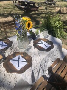 Local Roots Round Top’s catered lunch set-up on the lawn of Junk Gypsy.