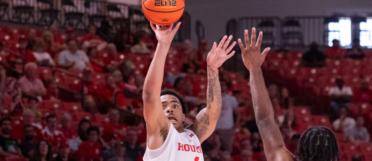 University of Houston head coach Kelvin Sampson visited with Drew Richards, head coach of the UNC Pembroke Braves, his alma mater, before an exhibition contest