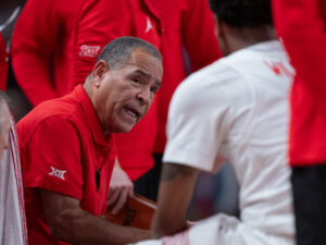 University of Houston head coach Kelvin Sampson coaches the Cougars over the Rice Owls 75-29