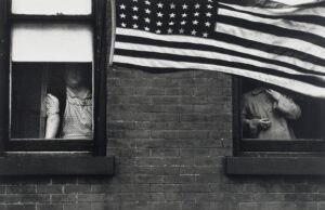 Robert Frank’s “Parade, Hoboken, New Jersey,” 1955–1956, printed 1972–1977, at the Museum of Fine Arts, Houston. (Collection Museum of Fine Arts, Houston, the Target Collection of American Photography, museum purchase funded by Target Stores. © The June Leaf and Robert Frank Foundation.)