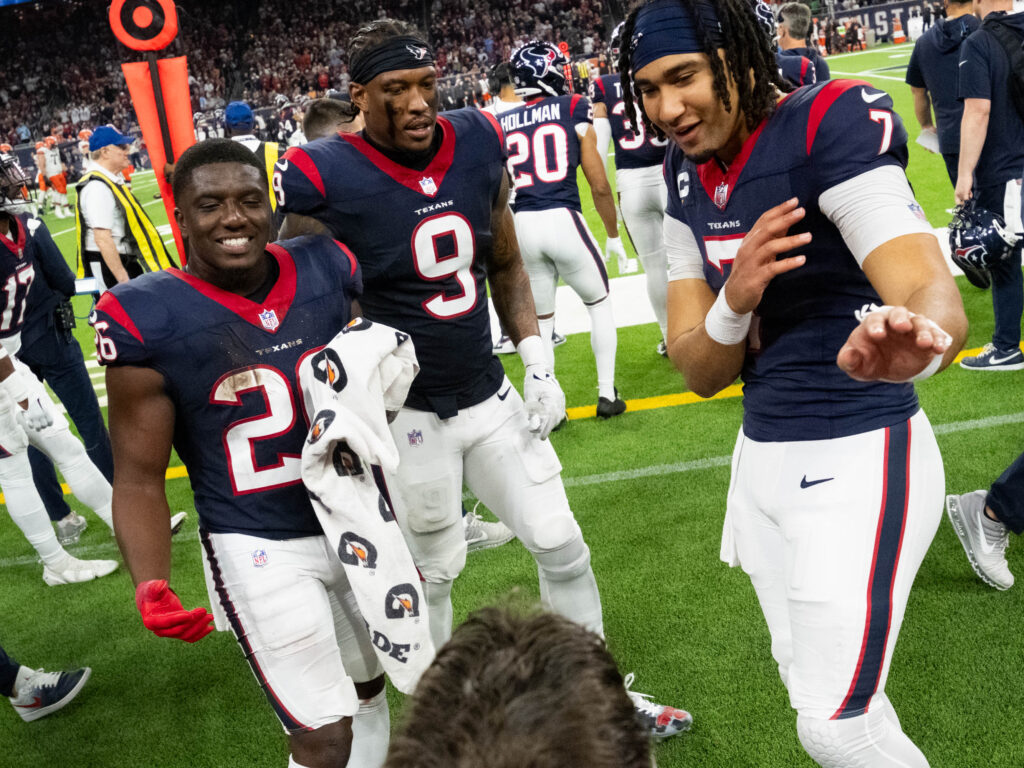 Houston Texans quarterback C.J. Stroud (far right) has a way of making his teammates believe. (Photo by F. Carter Smith)
