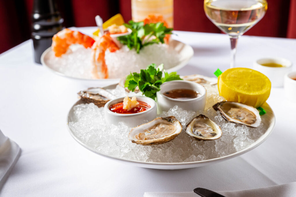 Rosebud Steakhouse serves oysters and shrimp on ice for a classic steakhouse starter.