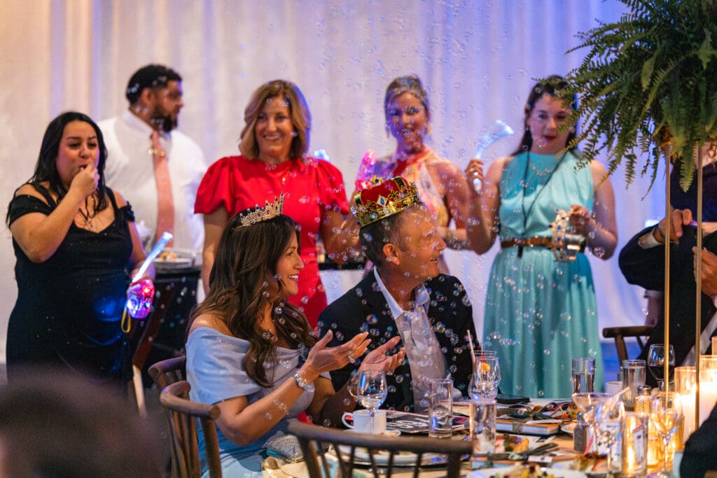 Each live auction winner was celebrated with fun fanfare, like whistles, bubbles, crowns and a round of applause. (Photo courtesy of TWCA)